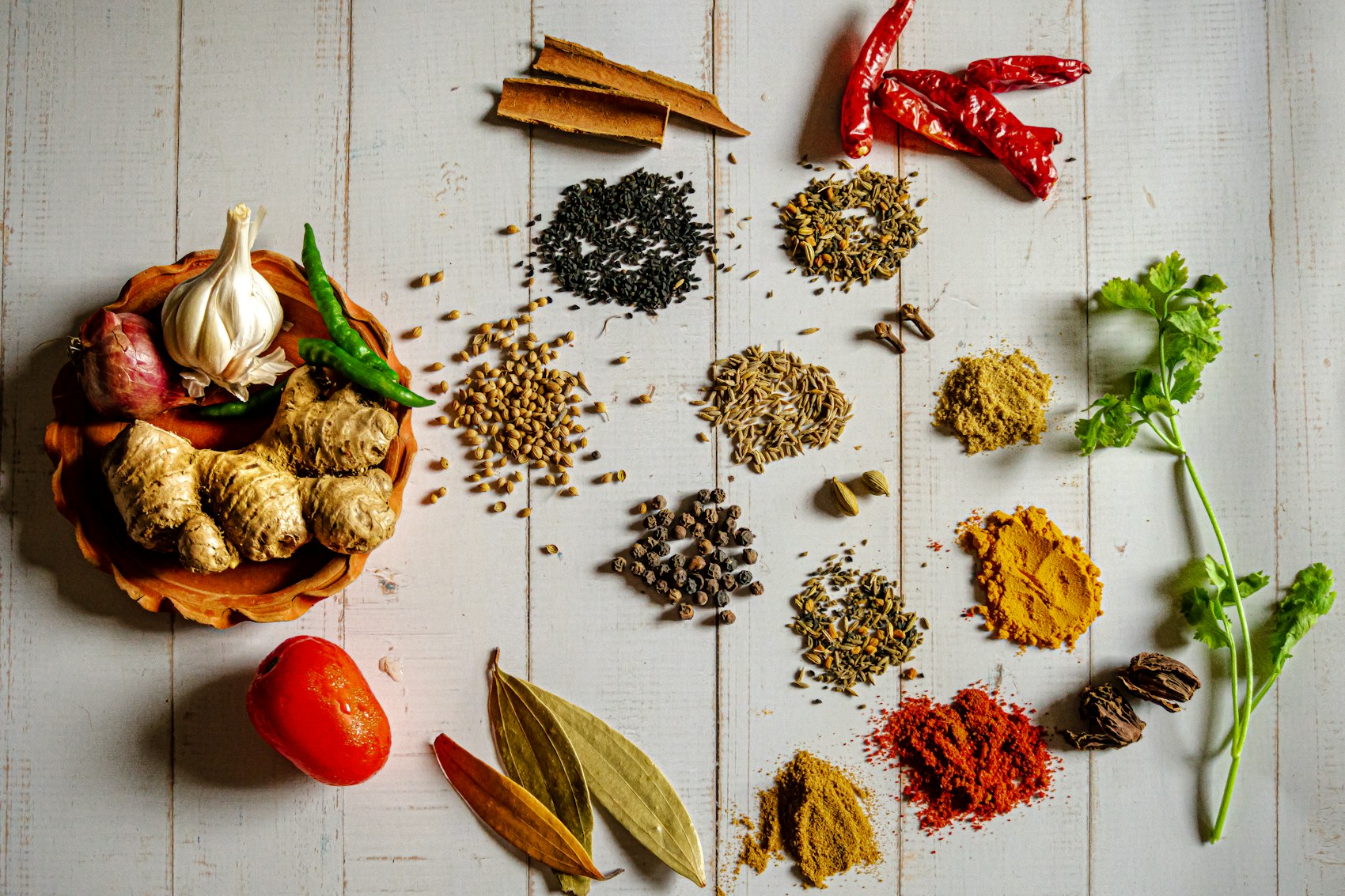 An arrangement of Indian spices, lentils and grains